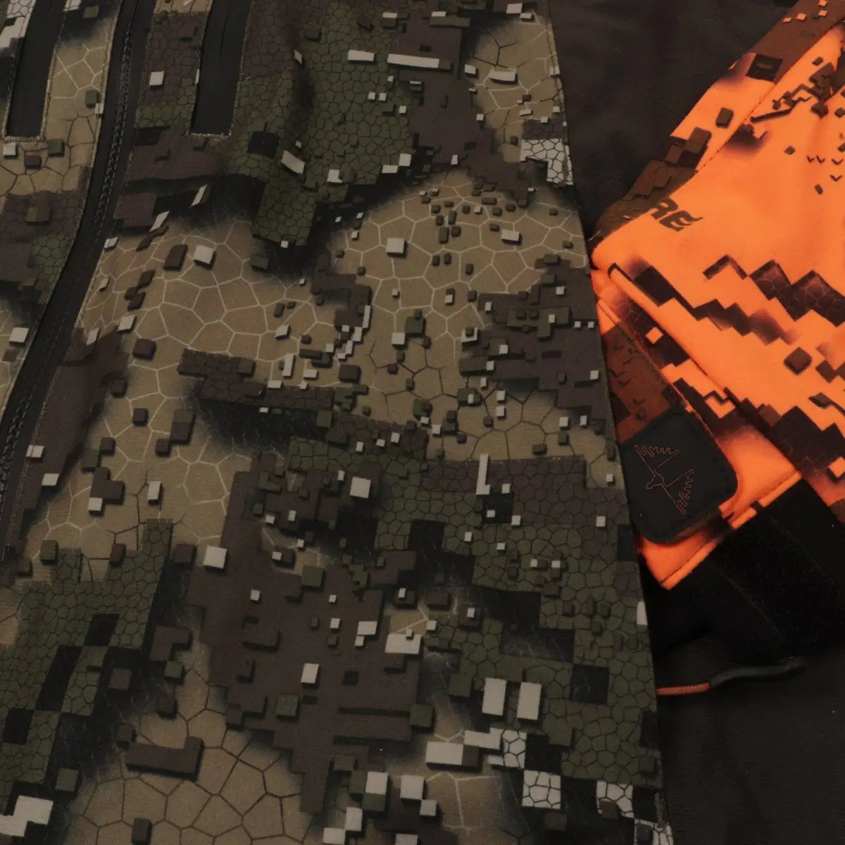 Es handelt sich hier um Herren Jagdjacke Ridge Pro 2 Desolve Fire/Veil Swedteam für die Jagd.