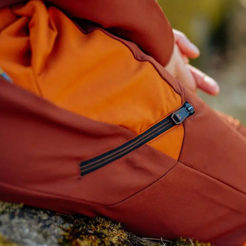 Es handelt sich hier um Damen Jagd Hose Lynx Antibite Dark Orange Swedteam für die Jagd.