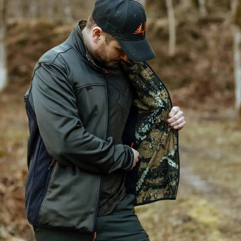 Es handelt sich hier um Herren Jagdjacke Ridge Pro Reversible RE-ECO Desolve Veil Swedteam für die Jagd.